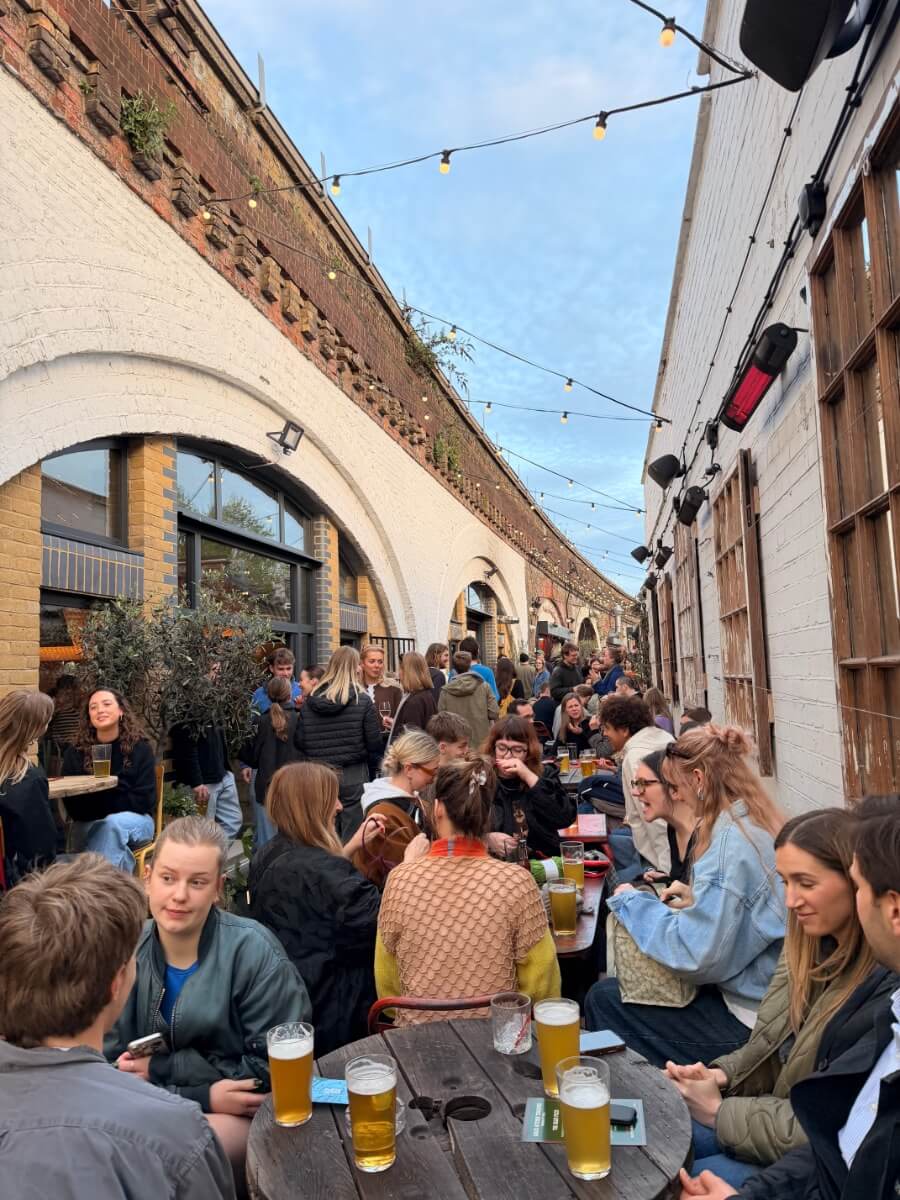 Beer garden with string lights in the evening