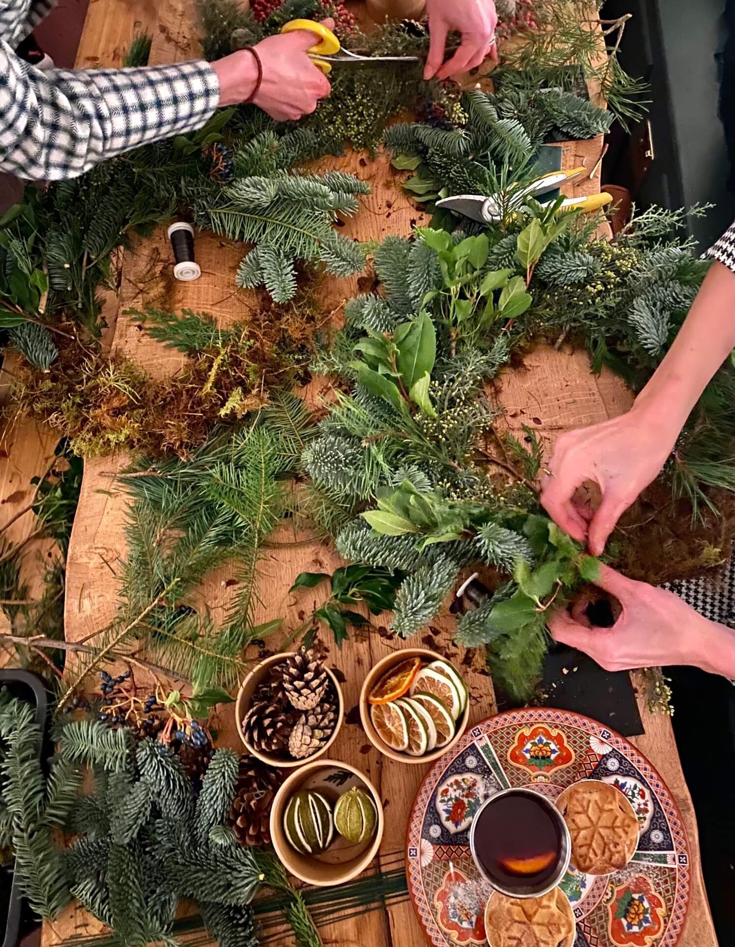 People doing a wreath making workshop